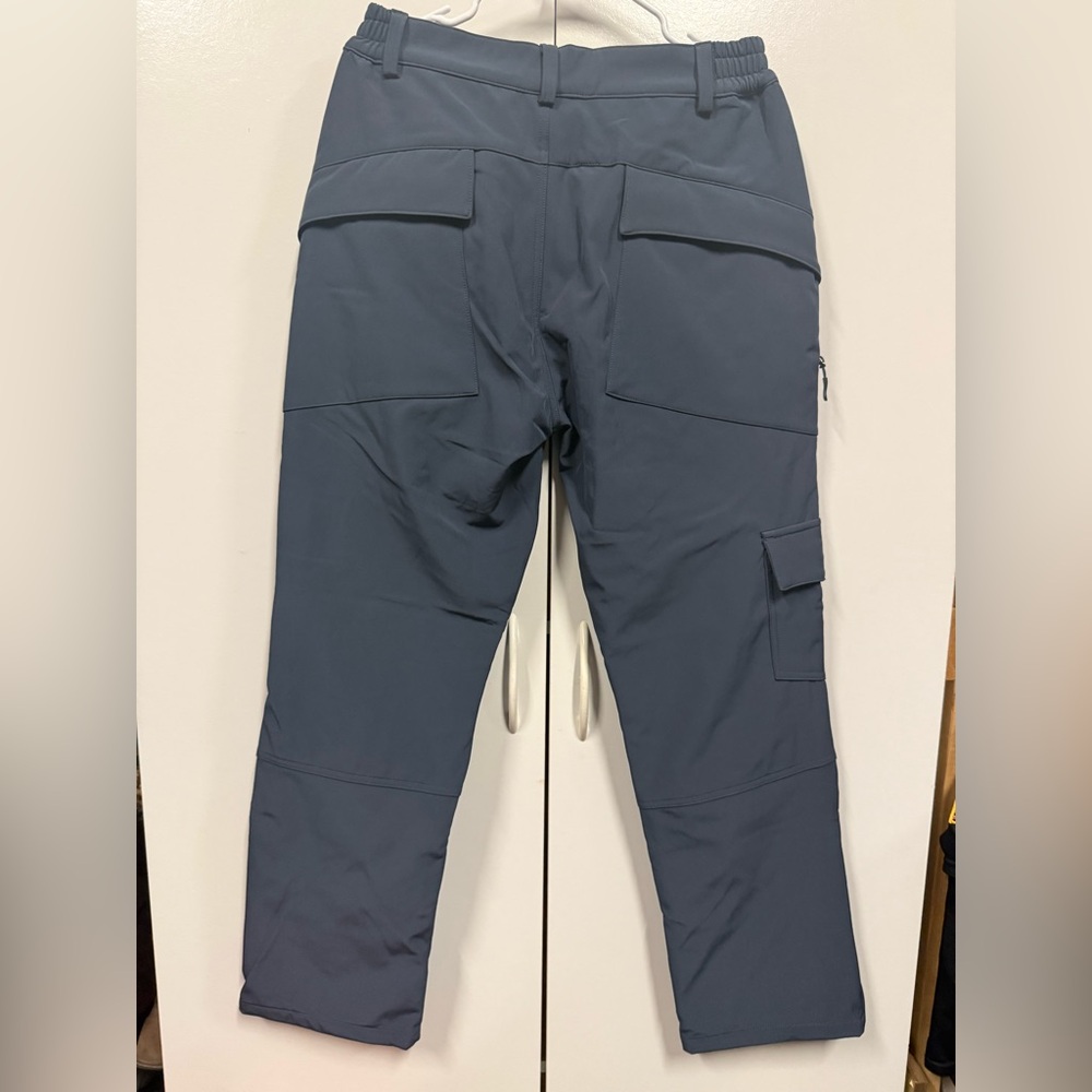 New with tags. Waterproof and warm snow pants.  Lightweight and comfy.  Medium